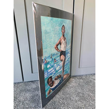 Load image into Gallery viewer, Two male seaside swimmers pencil on paper in aqua blue by London based portrait artist Stella Tooth side